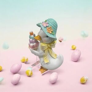 Charming Duck Figurine with Blue Hat